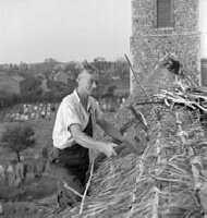 Thatching the roof of St Margaret and All Saints church, Pakefield, Suffolk (1949)