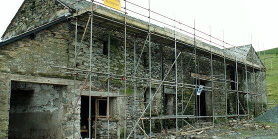 Traditional farm building being repaired in the Lake District ESA